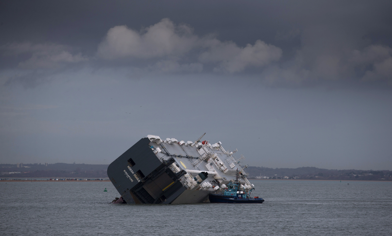 Illustration for article titled These Photos Of That Grounded Car Carrier Ship Are Beautifully Surreal